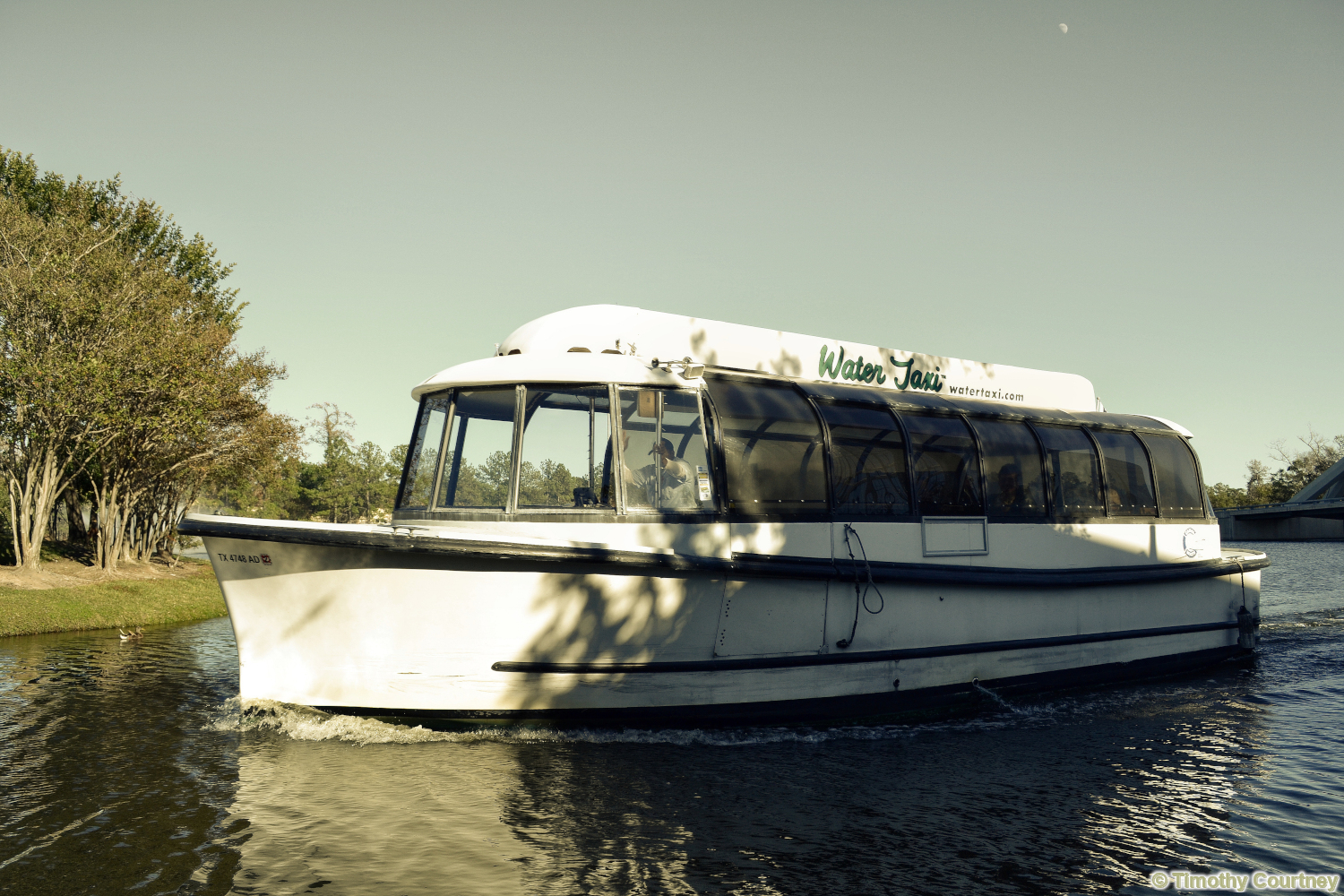 This boat is a water taxi taking tourists along the waterway in The Woodlands Texas