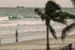 Galveston is a painting by Timothy Courtney of the Gulf beach with a ship in the distance, birds flying above, and people enjoying the sands with their dog.